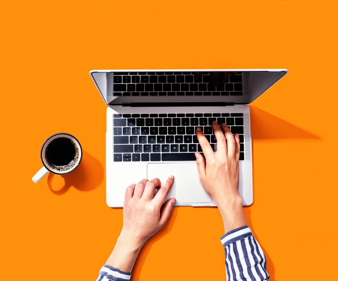A senior living operator reviewing real-time staffing and budget data on a laptop